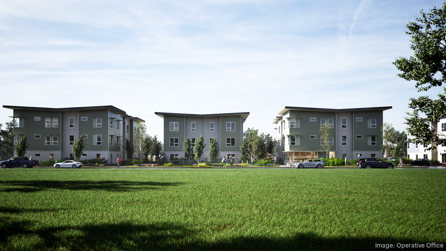 A rendered image of multifamily houses with green grass in foreground