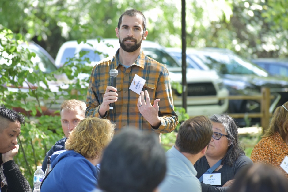 Person speaking into microphone